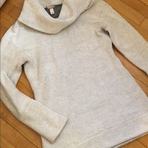 Sweater; fits more like an XS.